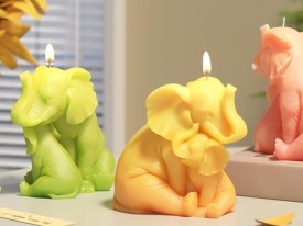 Elefante sentado con hijo